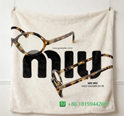Miumiu Throw Blankets